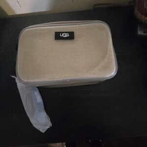 UGG Cream Travel Case Crossbody  purse.